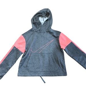 Grey and Pink Nike hoodie sweater with string on the inside to tighten it.